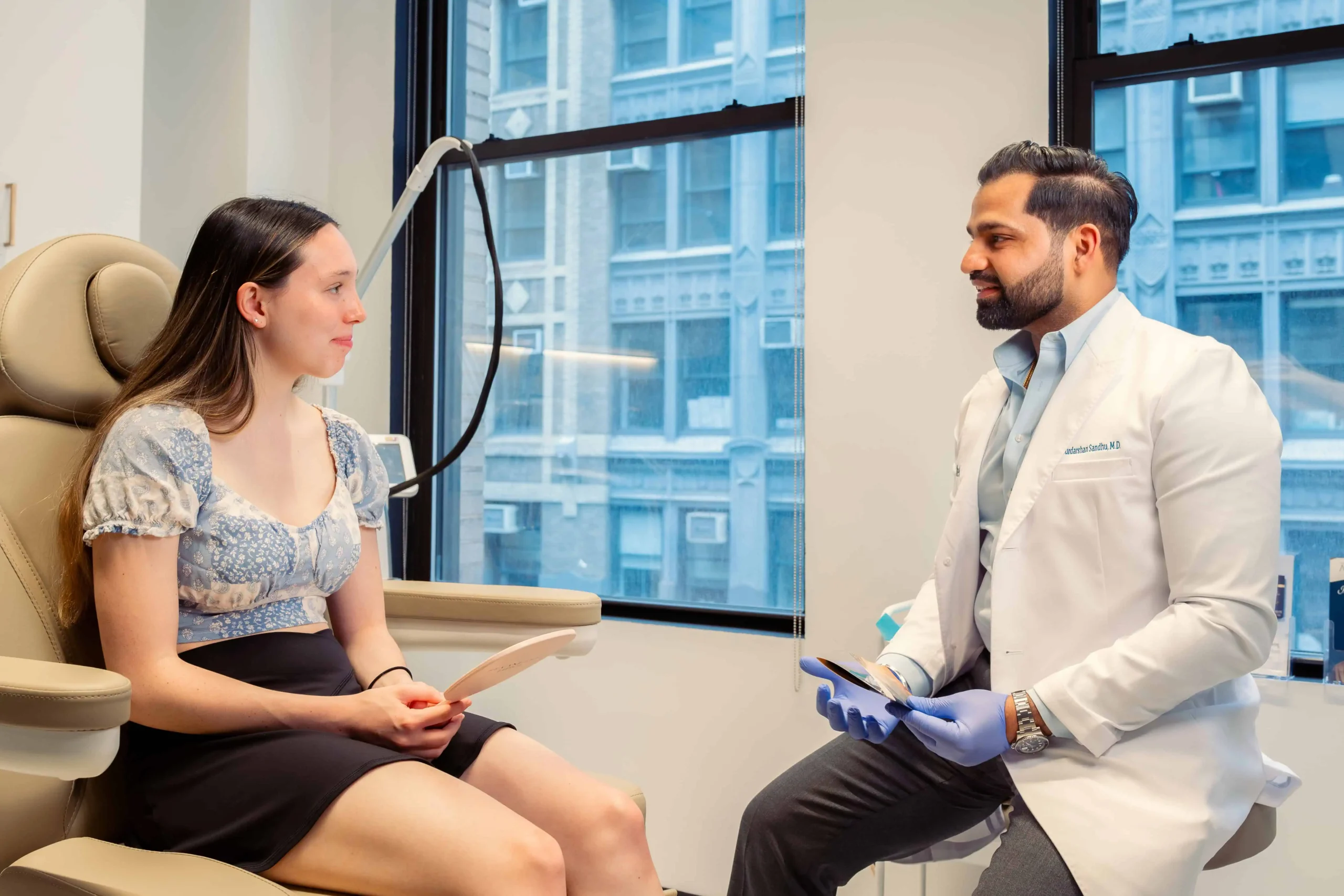 An esthetician talking to a patient | Aesthetify | Watchung, NJ | New York, NY